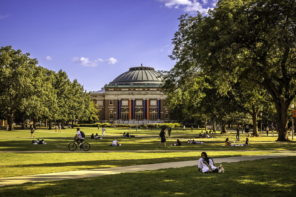 The main quad at the University of Illinois with Foellinger Hall in the Background in the evening.