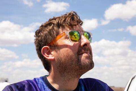 Steve Nesbitt in the field watching a weather balloon release. Photo by Amelia Holowaty Krales / The Verge