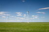 Wind turbines in a field.